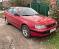 Красный Тойота Карина, объемом двигателя 1.76 л и пробегом 428 тыс. км за 2800 $, фото 1 на Automoto.ua