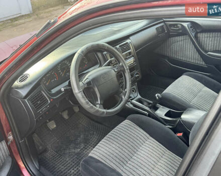 Красный Тойота Карина, объемом двигателя 1.6 л и пробегом 259 тыс. км за 2800 $, фото 8 на Automoto.ua