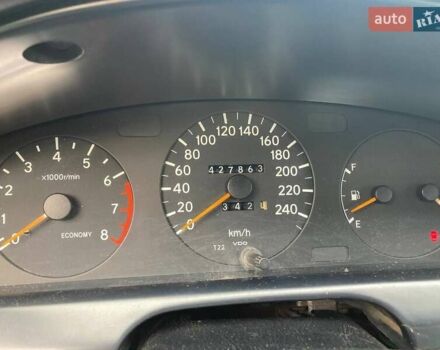 Красный Тойота Карина, объемом двигателя 1.76 л и пробегом 428 тыс. км за 2800 $, фото 1 на Automoto.ua