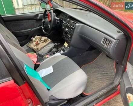 Красный Тойота Карина, объемом двигателя 1.76 л и пробегом 428 тыс. км за 2800 $, фото 6 на Automoto.ua