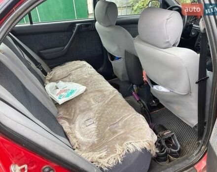 Красный Тойота Карина, объемом двигателя 1.76 л и пробегом 428 тыс. км за 2800 $, фото 10 на Automoto.ua