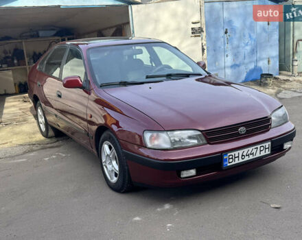 Красный Тойота Карина, объемом двигателя 1.6 л и пробегом 259 тыс. км за 2800 $, фото 3 на Automoto.ua