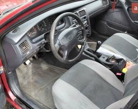 Красный Тойота Карина, объемом двигателя 1.76 л и пробегом 428 тыс. км за 2800 $, фото 11 на Automoto.ua