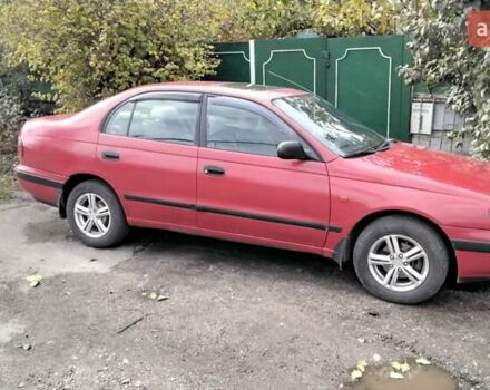 Красный Тойота Карина, объемом двигателя 1.76 л и пробегом 428 тыс. км за 2800 $, фото 13 на Automoto.ua