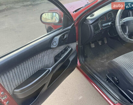 Красный Тойота Карина, объемом двигателя 1.6 л и пробегом 259 тыс. км за 2800 $, фото 9 на Automoto.ua