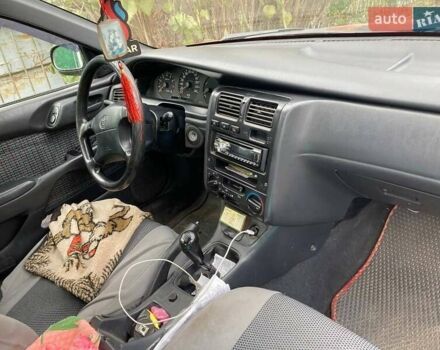 Красный Тойота Карина, объемом двигателя 1.76 л и пробегом 428 тыс. км за 2800 $, фото 2 на Automoto.ua