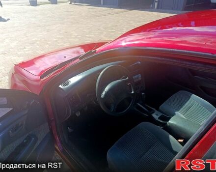 Червоний Тойота Каріна, об'ємом двигуна 1.8 л та пробігом 0 тис. км за 1970 $, фото 6 на Automoto.ua