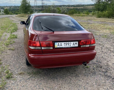 Червоний Тойота Каріна, об'ємом двигуна 1.6 л та пробігом 260 тис. км за 2100 $, фото 2 на Automoto.ua