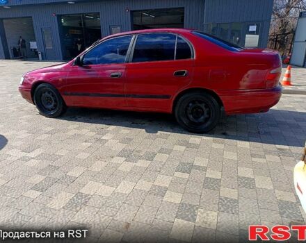 Червоний Тойота Каріна, об'ємом двигуна 1.8 л та пробігом 0 тис. км за 1970 $, фото 1 на Automoto.ua