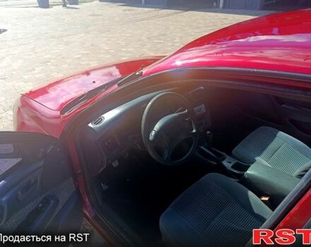 Червоний Тойота Каріна, об'ємом двигуна 1.8 л та пробігом 0 тис. км за 1970 $, фото 7 на Automoto.ua