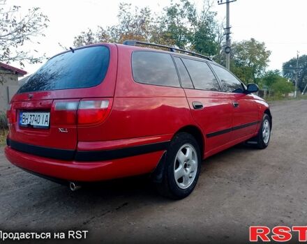 Червоний Тойота Каріна, об'ємом двигуна 1.6 л та пробігом 111 тис. км за 1999 $, фото 6 на Automoto.ua