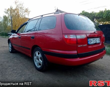 Червоний Тойота Каріна, об'ємом двигуна 1.6 л та пробігом 111 тис. км за 1999 $, фото 4 на Automoto.ua