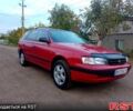 Червоний Тойота Каріна, об'ємом двигуна 1.6 л та пробігом 111 тис. км за 1999 $, фото 1 на Automoto.ua