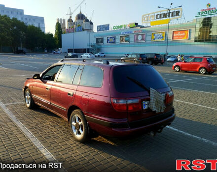 Червоний Тойота Каріна, об'ємом двигуна 2 л та пробігом 450 тис. км за 3700 $, фото 9 на Automoto.ua