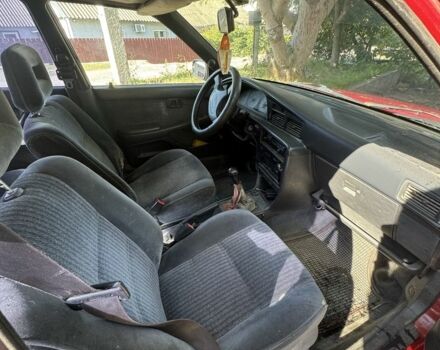 Червоний Тойота Каріна, об'ємом двигуна 1.6 л та пробігом 64 тис. км за 800 $, фото 4 на Automoto.ua