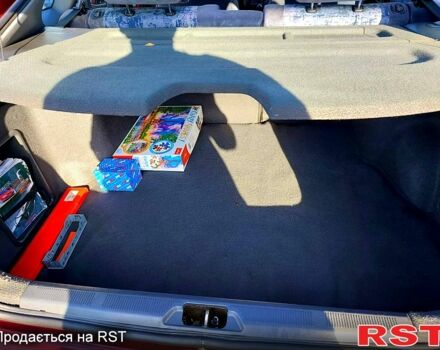 Красный Тойота Карина, объемом двигателя 1.8 л и пробегом 344 тыс. км за 3100 $, фото 9 на Automoto.ua