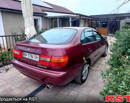 Красный Тойота Карина, объемом двигателя 1.8 л и пробегом 344 тыс. км за 3100 $, фото 10 на Automoto.ua