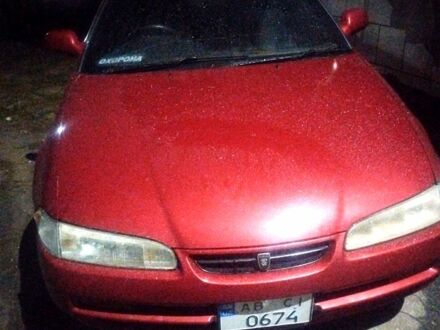 Червоний Тойота Каріна, об'ємом двигуна 1.6 л та пробігом 192 тис. км за 900 $, фото 1 на Automoto.ua