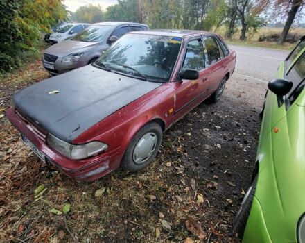 Красный Тойота Карина, объемом двигателя 1.6 л и пробегом 500 тыс. км за 804 $, фото 1 на Automoto.ua