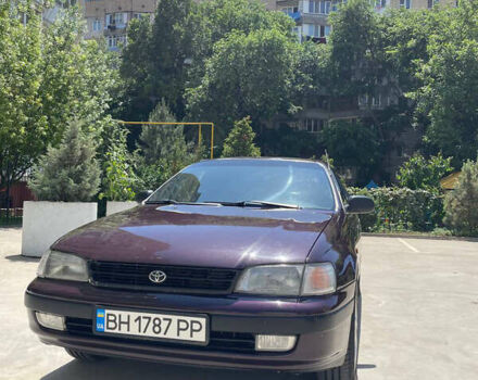 Красный Тойота Карина, объемом двигателя 1.59 л и пробегом 650 тыс. км за 3700 $, фото 1 на Automoto.ua