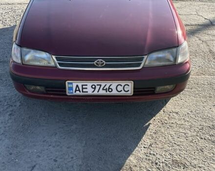 Красный Тойота Карина, объемом двигателя 2 л и пробегом 380 тыс. км за 2500 $, фото 1 на Automoto.ua