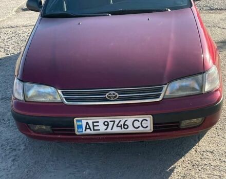 Красный Тойота Карина, объемом двигателя 2 л и пробегом 320 тыс. км за 3500 $, фото 1 на Automoto.ua