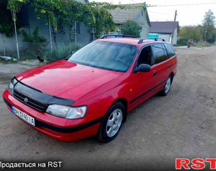 Красный Тойота Карина, объемом двигателя 1.6 л и пробегом 111 тыс. км за 1999 $, фото 1 на Automoto.ua