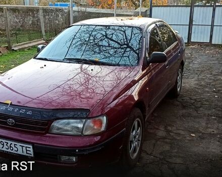 Красный Тойота Карина, объемом двигателя 1.6 л и пробегом 167 тыс. км за 1600 $, фото 1 на Automoto.ua