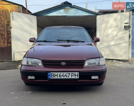 Красный Тойота Карина, объемом двигателя 1.6 л и пробегом 259 тыс. км за 2800 $, фото 1 на Automoto.ua