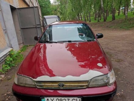 Красный Тойота Карина, объемом двигателя 1.8 л и пробегом 250 тыс. км за 1400 $, фото 1 на Automoto.ua