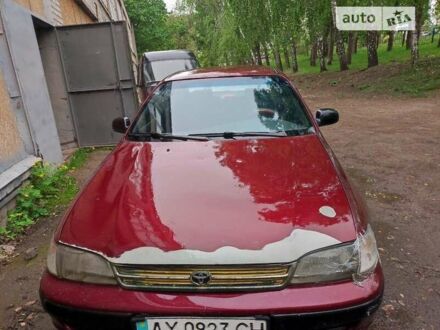 Красный Тойота Карина, объемом двигателя 1.8 л и пробегом 250 тыс. км за 1500 $, фото 1 на Automoto.ua
