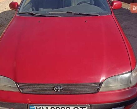 Красный Тойота Карина, объемом двигателя 1.59 л и пробегом 280 тыс. км за 2500 $, фото 1 на Automoto.ua