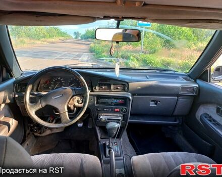 Тойота Карина, объемом двигателя 1.6 л и пробегом 255 тыс. км за 800 $, фото 2 на Automoto.ua