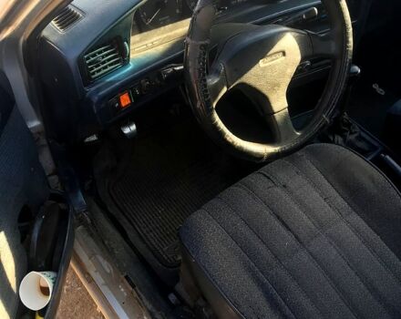 Тойота Каріна, об'ємом двигуна 16 л та пробігом 200 тис. км за 1000 $, фото 2 на Automoto.ua