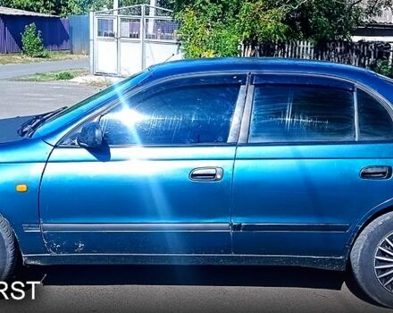 Тойота Карина, объемом двигателя 1.8 л и пробегом 66 тыс. км за 1700 $, фото 1 на Automoto.ua