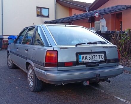 Сірий Тойота Каріна, об'ємом двигуна 2 л та пробігом 236 тис. км за 2638 $, фото 2 на Automoto.ua