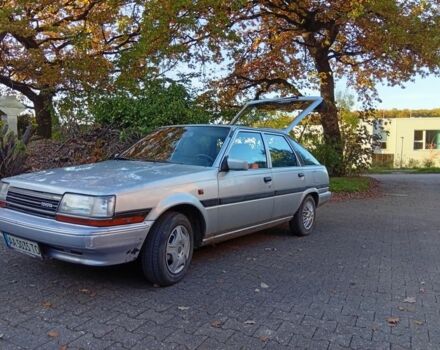 Сірий Тойота Каріна, об'ємом двигуна 2 л та пробігом 236 тис. км за 2638 $, фото 1 на Automoto.ua