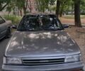 Серый Тойота Карина, объемом двигателя 1.6 л и пробегом 300 тыс. км за 1000 $, фото 1 на Automoto.ua