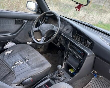 Серый Тойота Карина, объемом двигателя 1.6 л и пробегом 220 тыс. км за 1300 $, фото 5 на Automoto.ua