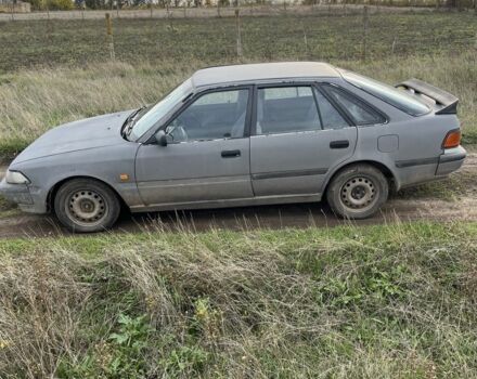 Серый Тойота Карина, объемом двигателя 1.6 л и пробегом 220 тыс. км за 1300 $, фото 2 на Automoto.ua