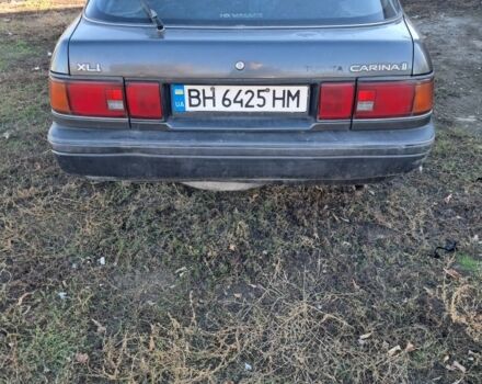 Серый Тойота Карина, объемом двигателя 1.6 л и пробегом 2 тыс. км за 800 $, фото 2 на Automoto.ua