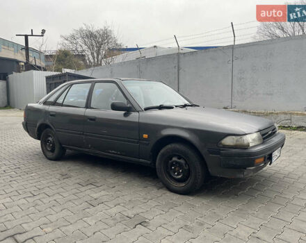 Сірий Тойота Каріна, об'ємом двигуна 1.59 л та пробігом 392 тис. км за 900 $, фото 1 на Automoto.ua