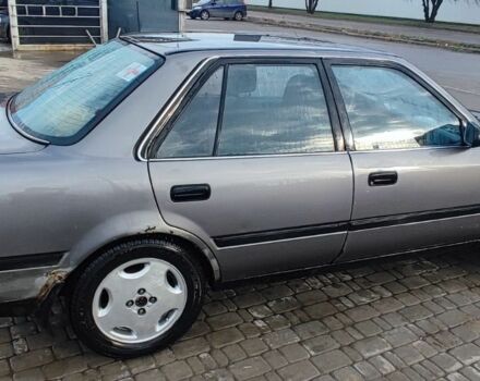 Серый Тойота Карина, объемом двигателя 1.6 л и пробегом 370 тыс. км за 952 $, фото 2 на Automoto.ua