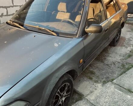 Серый Тойота Карина, объемом двигателя 1.6 л и пробегом 500 тыс. км за 600 $, фото 3 на Automoto.ua