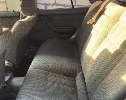 Серый Тойота Карина, объемом двигателя 1.6 л и пробегом 500 тыс. км за 600 $, фото 5 на Automoto.ua