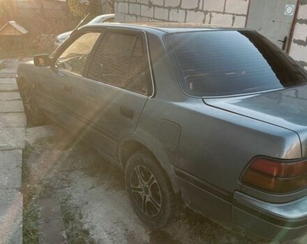 Серый Тойота Карина, объемом двигателя 1.6 л и пробегом 500 тыс. км за 600 $, фото 2 на Automoto.ua