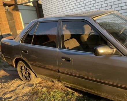 Серый Тойота Карина, объемом двигателя 1.6 л и пробегом 500 тыс. км за 600 $, фото 7 на Automoto.ua