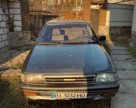 Серый Тойота Карина, объемом двигателя 1.6 л и пробегом 500 тыс. км за 600 $, фото 4 на Automoto.ua