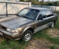 Сірий Тойота Каріна, об'ємом двигуна 1.6 л та пробігом 512 тис. км за 750 $, фото 1 на Automoto.ua