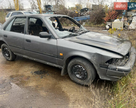 Серый Тойота Карина, объемом двигателя 2 л и пробегом 200 тыс. км за 500 $, фото 1 на Automoto.ua